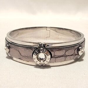 Henri Bendel Riveted Oval Hinged Bangle Bracelet